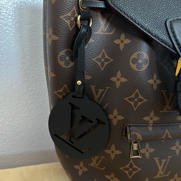 Authentic Louis Vuitton Montsouris PM (newer version) - Picture 5 of 9
